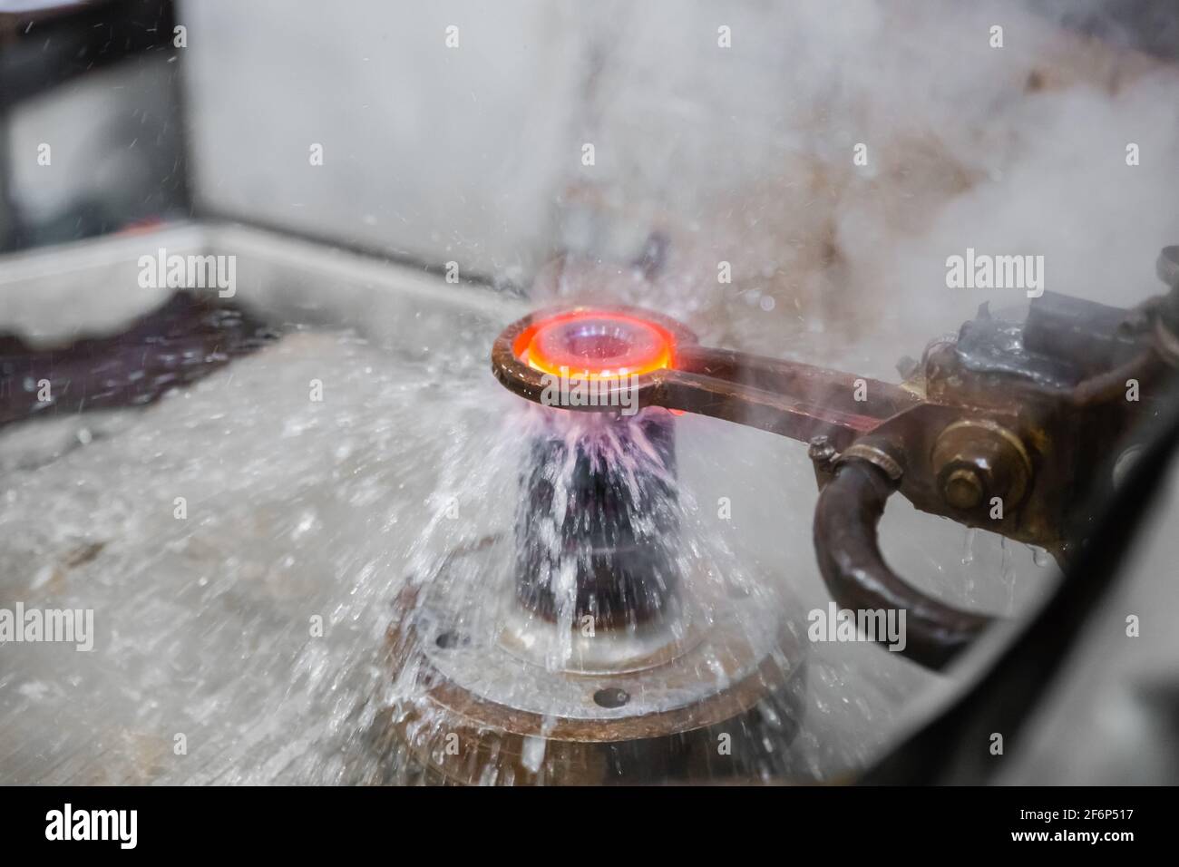 The process of heating and cooling a metal part Stock Photo Alamy