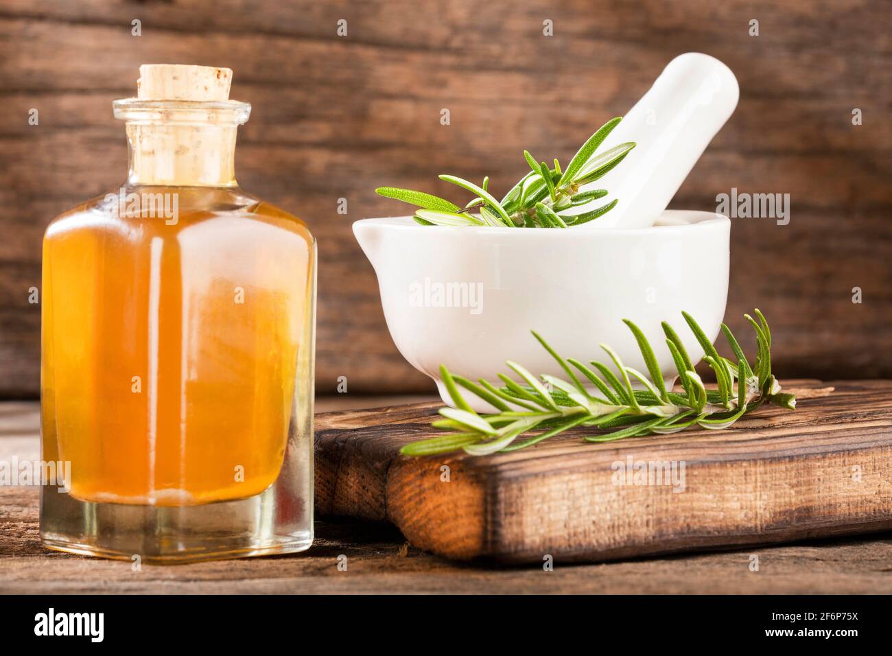 Rosmarinus officinalis - Rosemary leaves and oil Stock Photo - Alamy