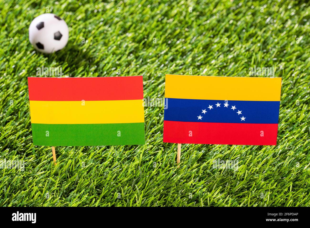 Flag of Bolivia and Venezuela in the football stadium - Cup America football match conmebol Brazil 2019. Stock Photo