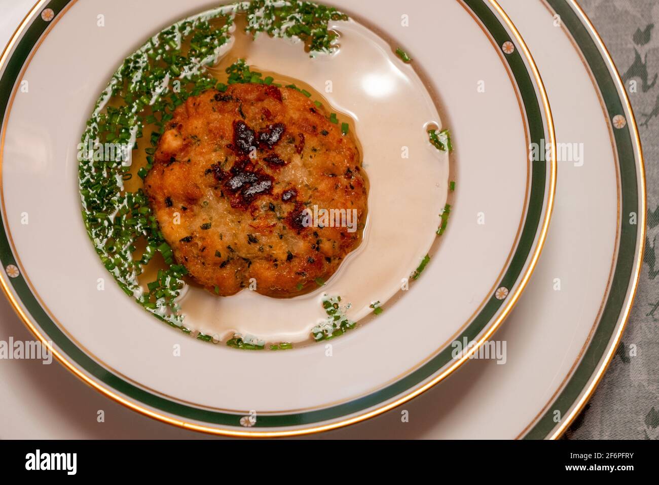 Kaspressknoedelsuppe, Beef Broth with Cheese Dumpling, a Traditional