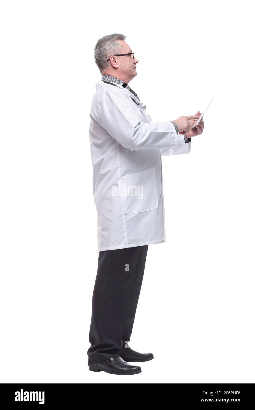 Full length portrait of male doctor using digital tablet isolated on white Stock Photo