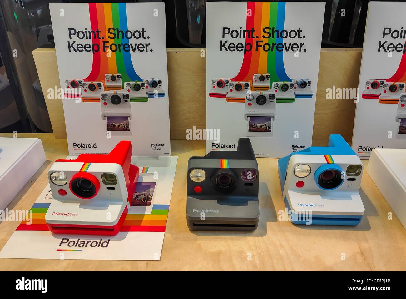 SHANGHAI, CHINA - APRIL 2, 2021 - Hundreds of Polaroid cameras are  displayed in the camera store of a shopping mall in Shanghai, China, on  April 2, 2021. Polaroid cameras of various