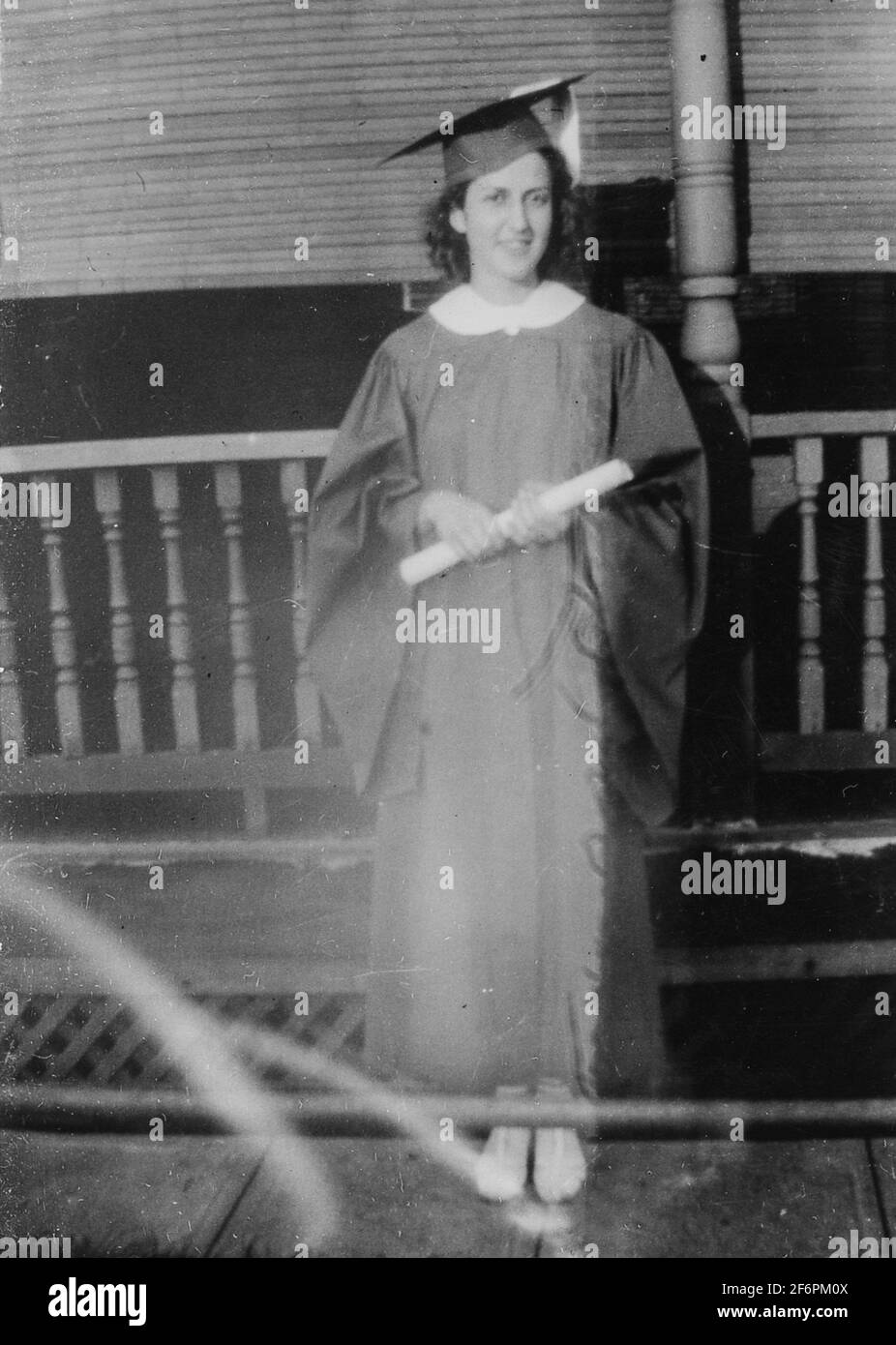 Young Woman Graduates in Cap and Gown, 1937, PA. USA Stock Photo