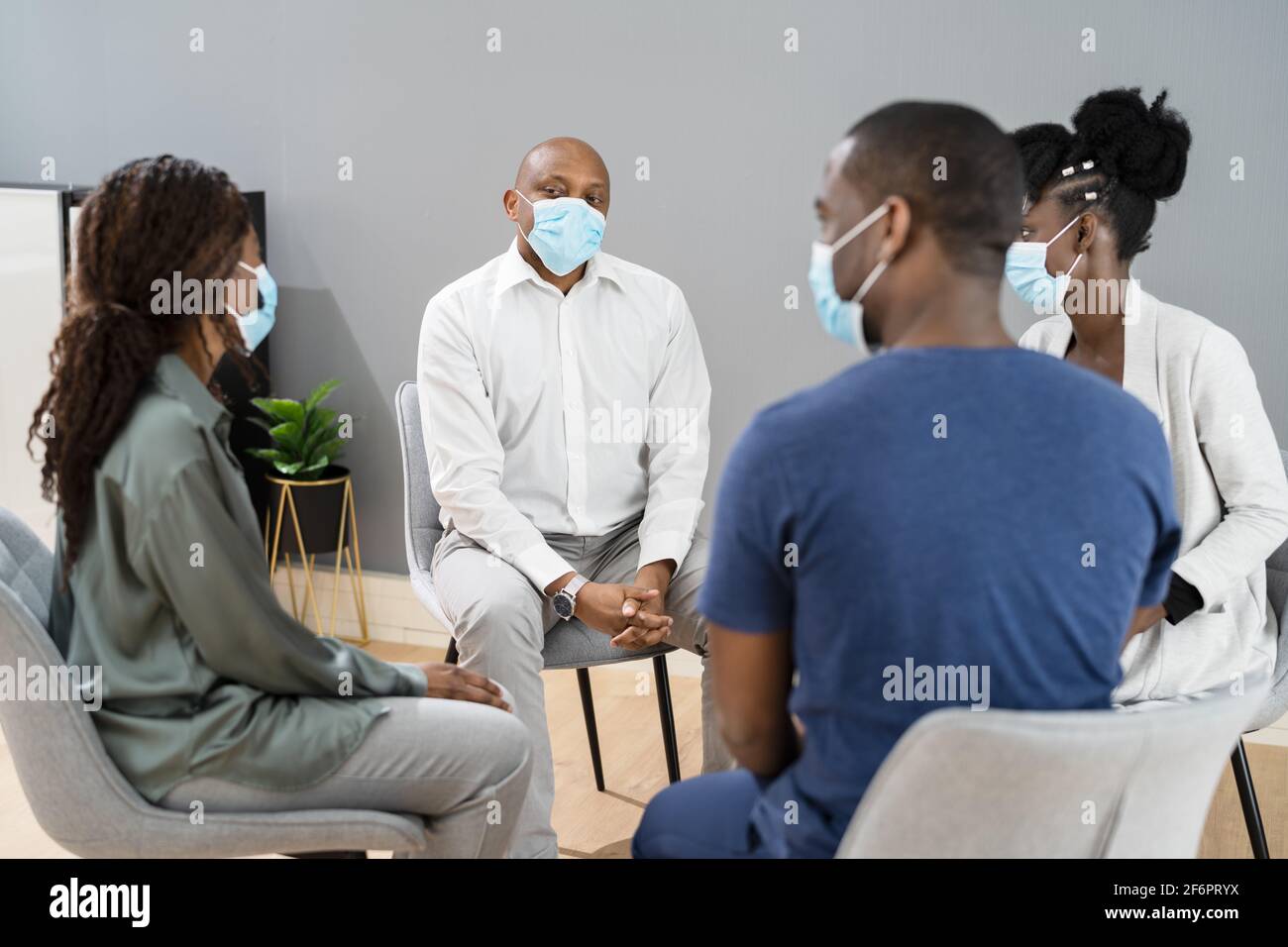 Listening Coordinator Community Counselor Talk In Face Mask Stock Photo