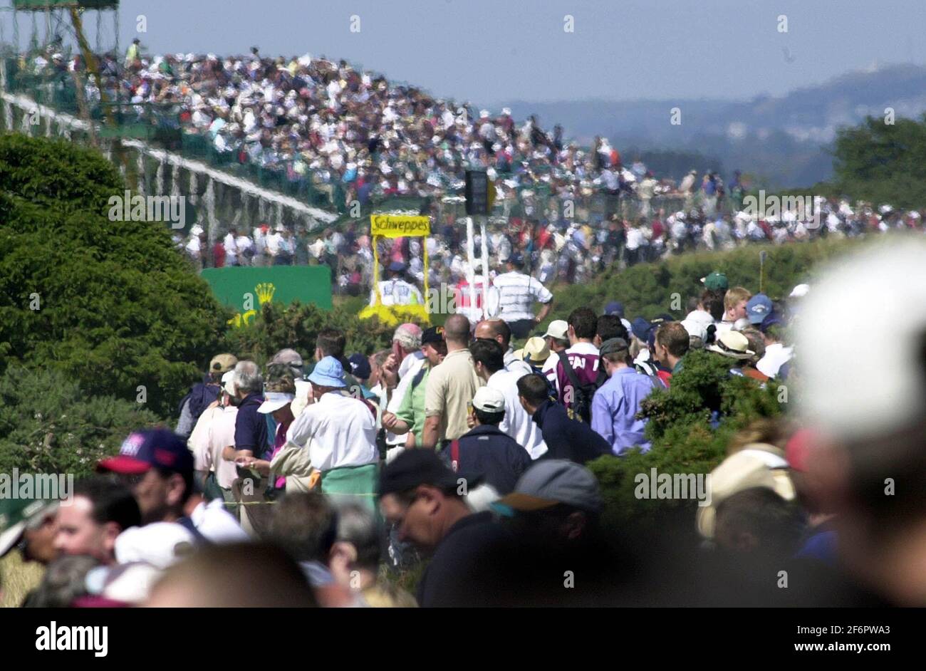 OPEN GOLF AT ST ANDREWS. CROWDS GATHER AROUND THE GREENS AT ST ANDREWS