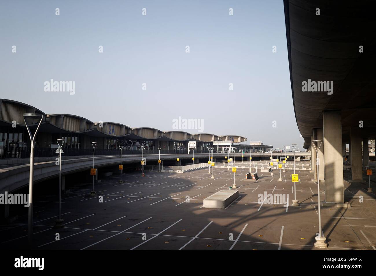 The empty parking of the closed Terminal 2A is seen at Charles-de-Gaulle  airport amid the coronavirus disease (COVID-19) outbreak, in Roissy, near  Paris, France April 2, 2021. REUTERS/Christian Hartmann Stock Photo -