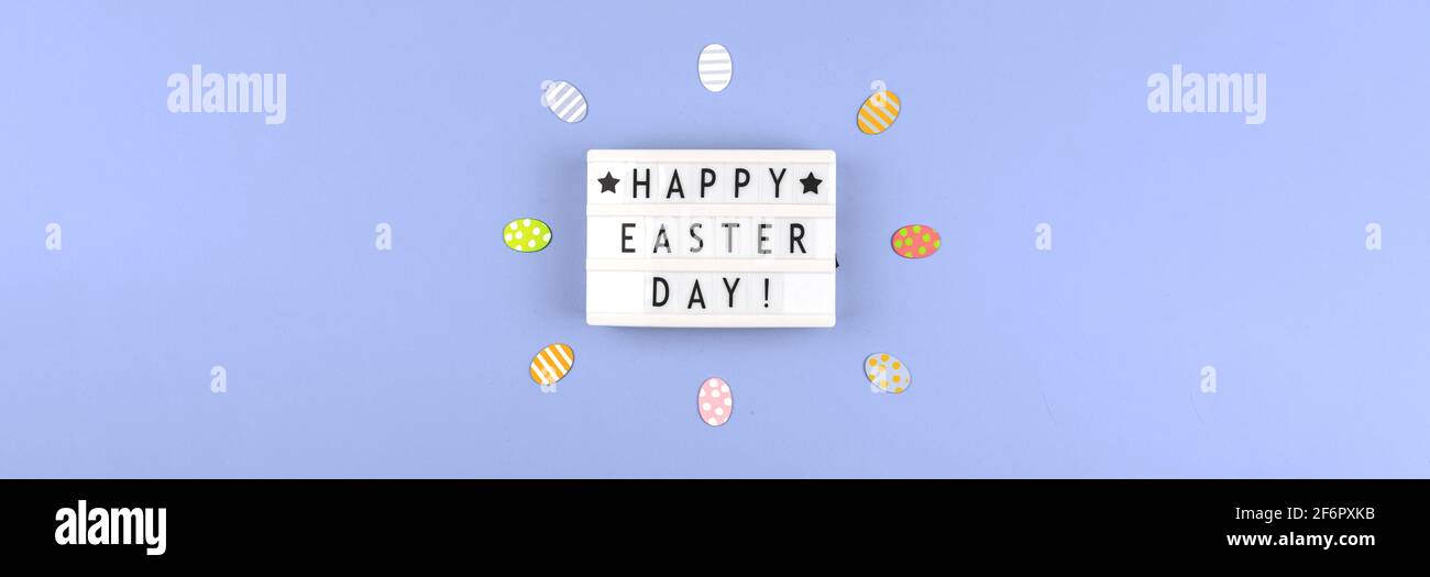 Happy Easter Day congratulatory banner, easter background with flat colored eggs Stock Photo