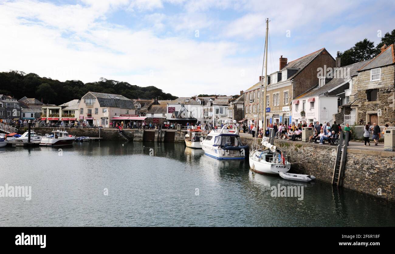 Padstow is a town, civil parish and fishing port on the north coast of Cornwall, England, United Kingdom. The town is situated on the west bank of the Stock Photo