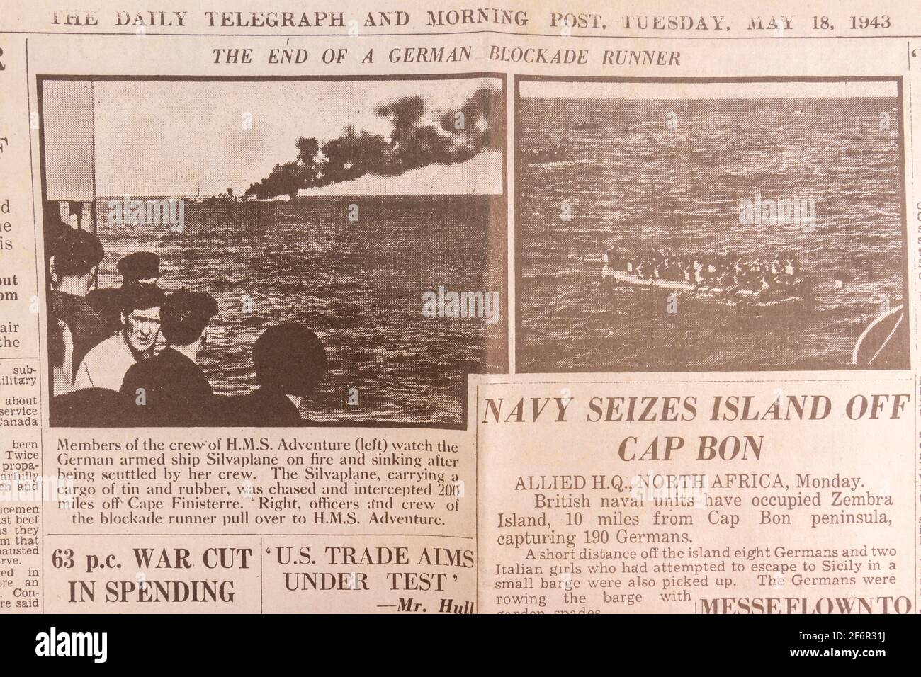 German blockade runner photos and story in the Daily Telegraph (replica), 18th May 1943, the day after the Dam Busters raid. Stock Photo
