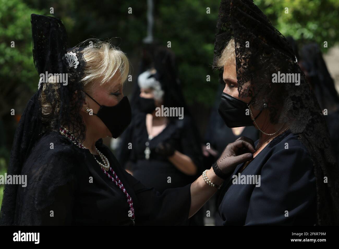 April 2, 2021: 2 April 2021 (Malaga) Mantilla women attend the Holy Offices of Good Friday on the occasion of Holy Week in Malaga Credit: Lorenzo Carnero/ZUMA Wire/Alamy Live News Stock Photo