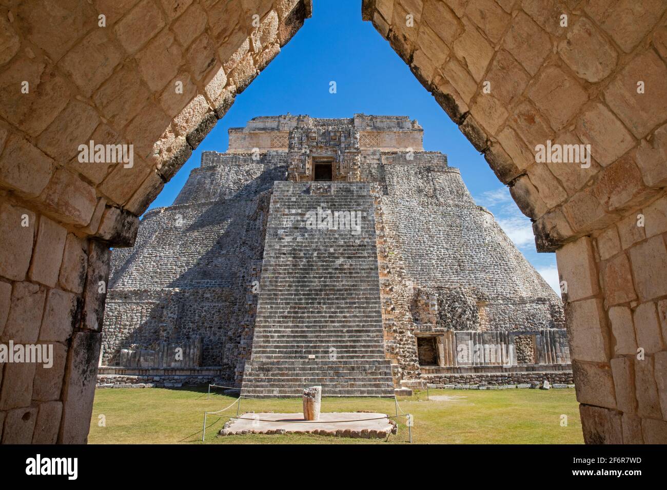 Pyramid of the Magician / Pirámide del adivino, Mesoamerican step pyramid in the ancient Mayan city Uxmal, Yucatán, Mexico Stock Photo
