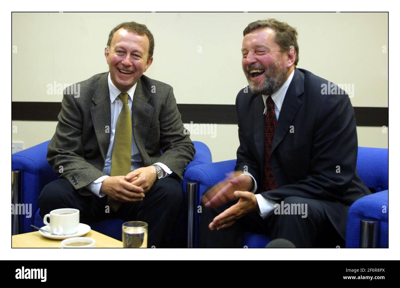 David Blunkett meets David Blunkett. P.C. on the Left, Home Sec. on the rt. The Cousins met at the Police Federation Conf in Bournmouth.pic David Sandison 15/5/2002 Stock Photo