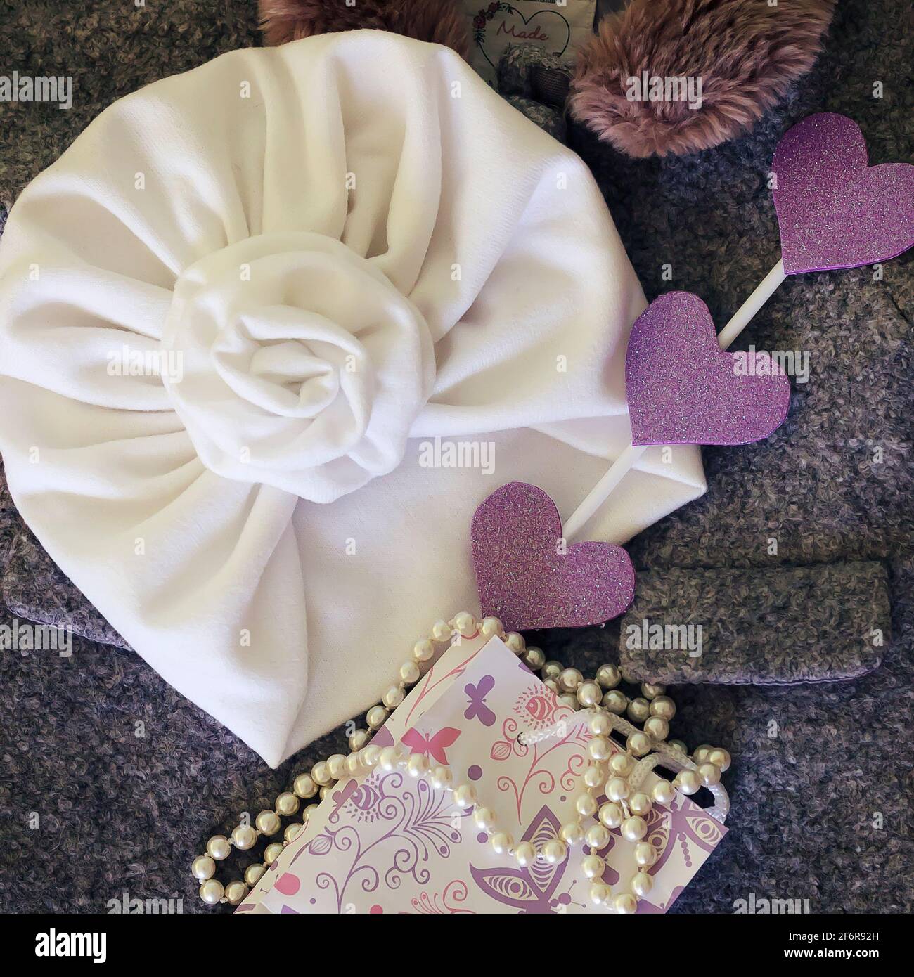 hat turban with a rose for a little girl. Photo. hand made Stock Photo