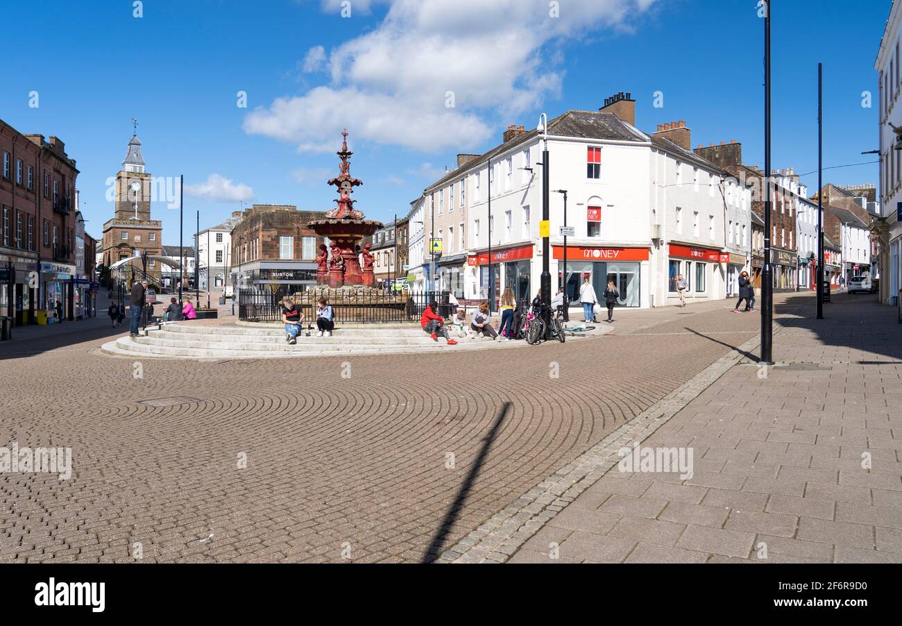 Dumfries, Scotland, UK. 2 April 2021. On the day when Scottish Government relaxes lockdown rules from “Stay at Home” to “Stay Local” the shopping streets of Dumfries town centre remain almost deserted with virtually no shops or businesses trading. Pic;  Square on High Street is very quiet despite the sunny spring weather. Iain Masterton/Alamy Live News Stock Photo