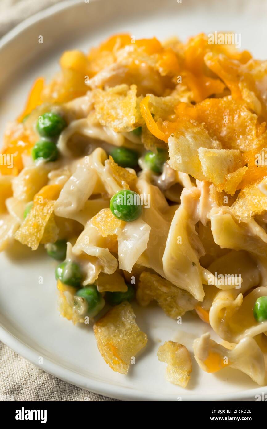 Homemade Cheesy Tuna Casserole with Peas and Egg Noodles Stock Photo