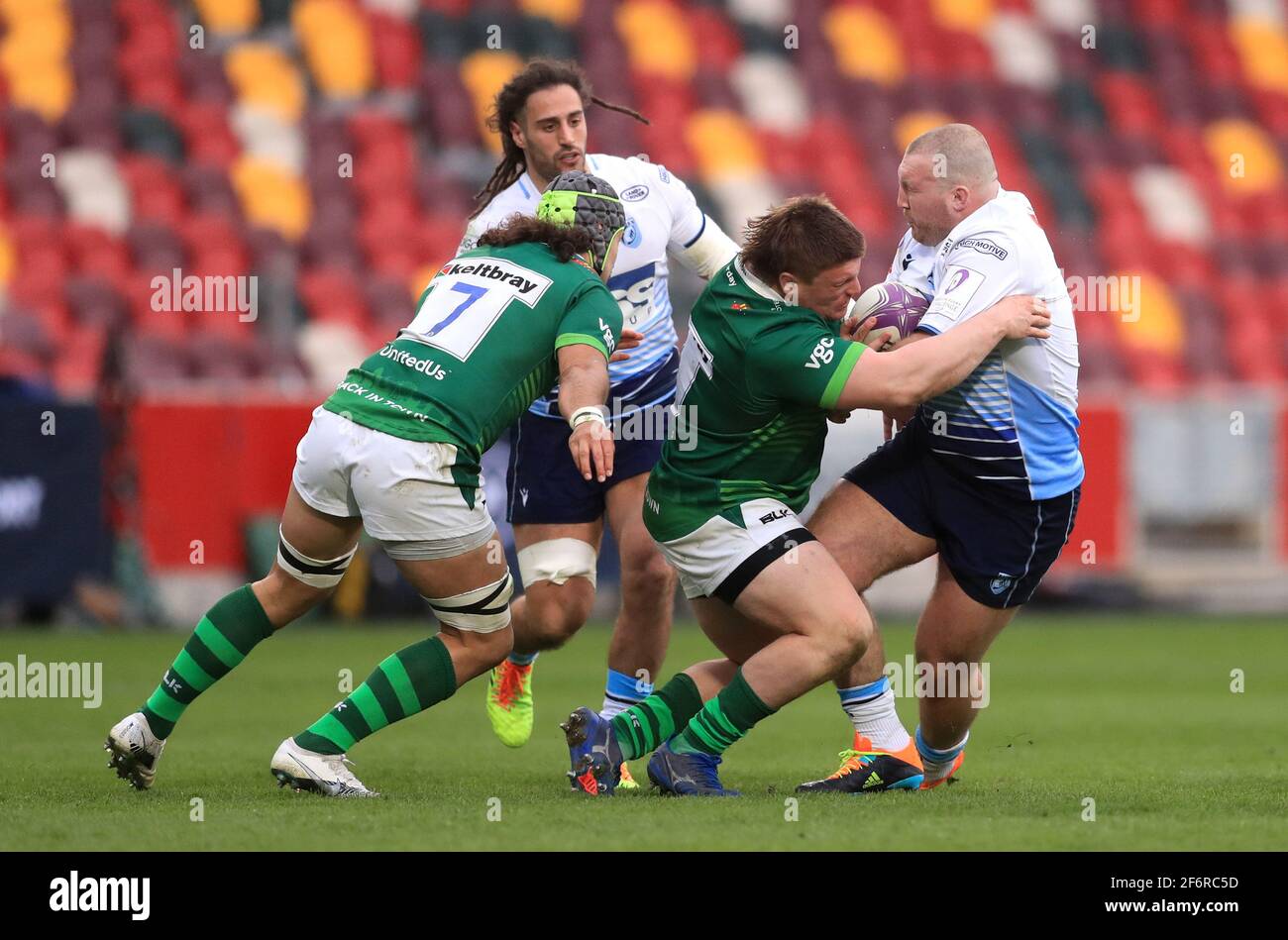 London Irish's William Goodrick-Clarke (second right) tackles Cardiff Blues's Dillon Lewis and results in a sending off following review, during the Heineken Challenge Cup match at the Brentford Community Stadium, London. Picture date: Friday April 2, 2021. Stock Photo