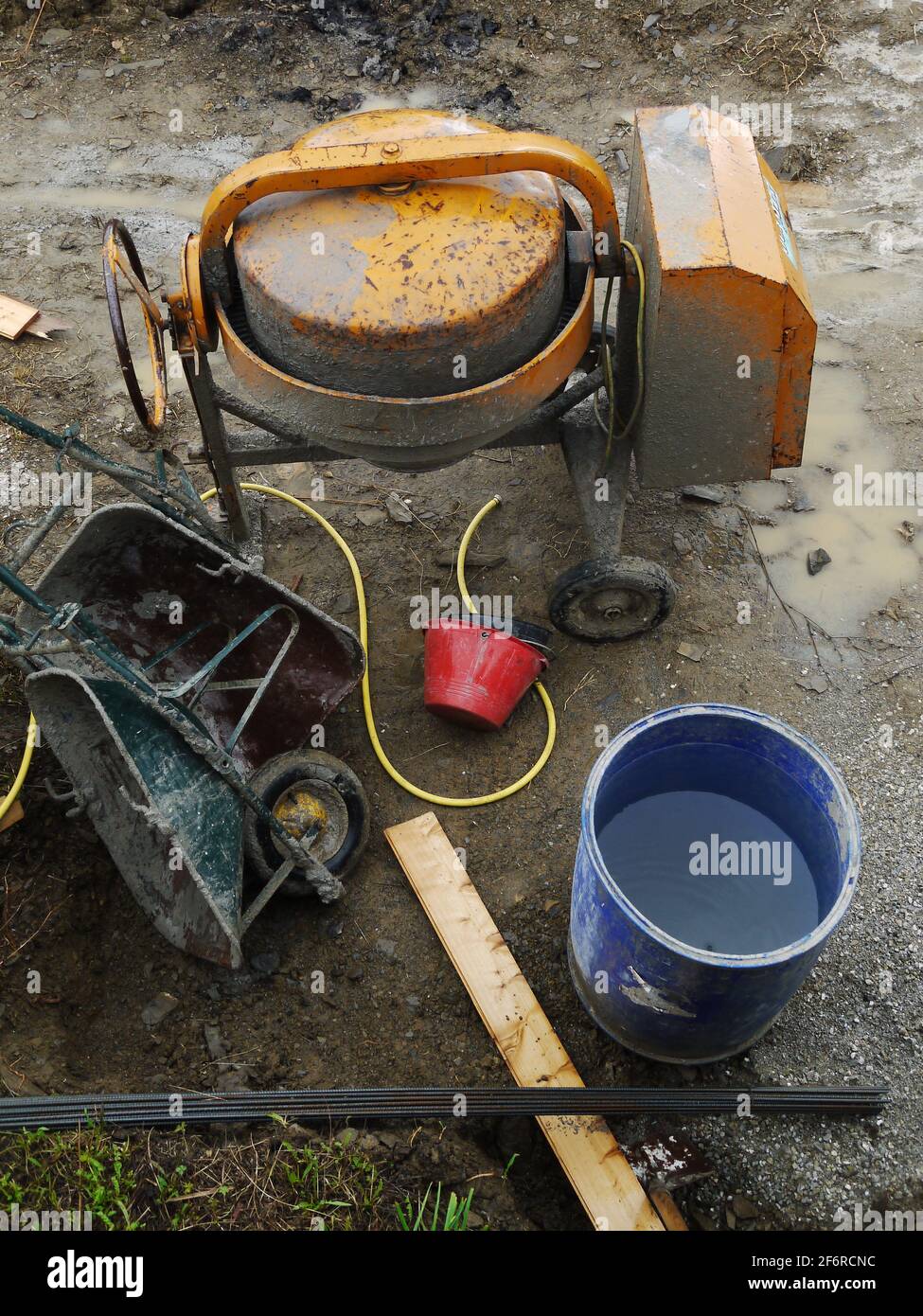 Cement mixer with wheels on a construction site Stock Photo Alamy