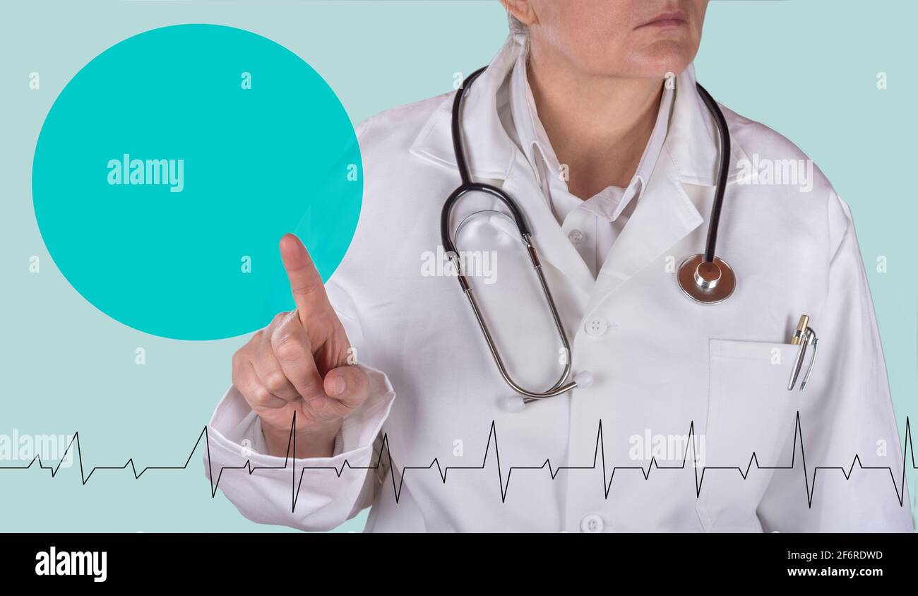 Female doctor with stethoscope raise finger and blank sign Stock Photo