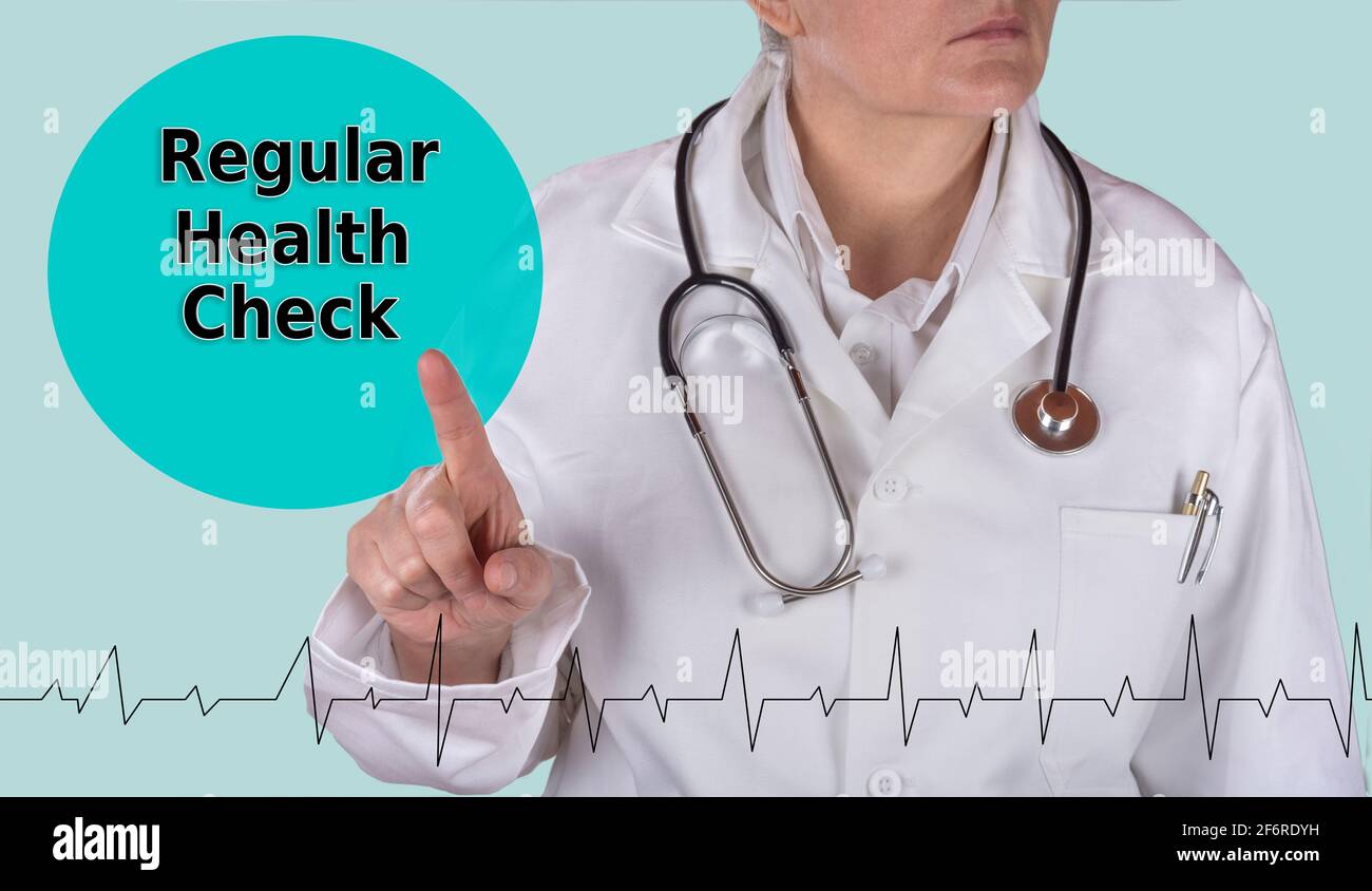 Female doctor with stethoscope raise finger and regular health check sign Stock Photo