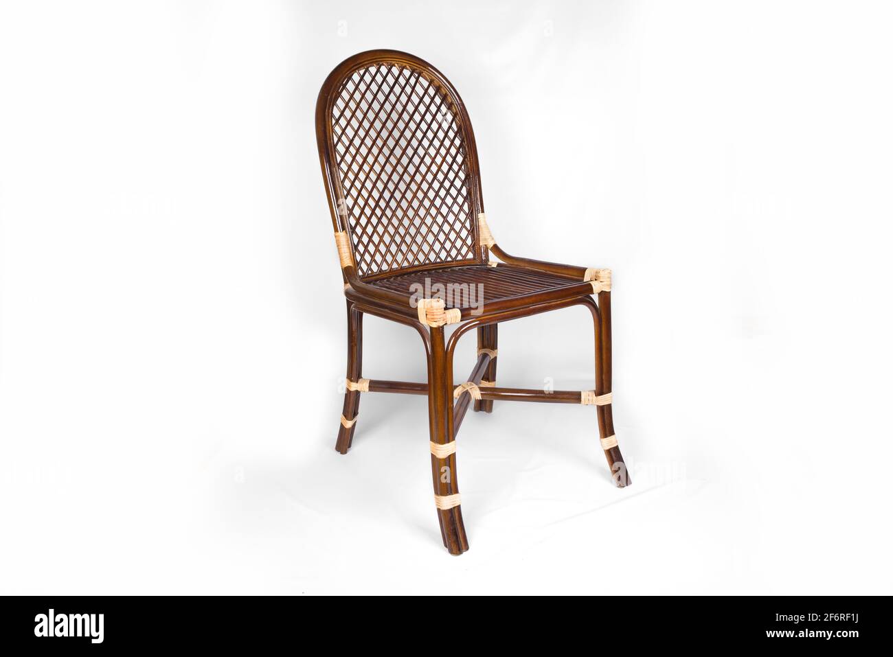 Rattan chair on a white background Stock Photo - Alamy