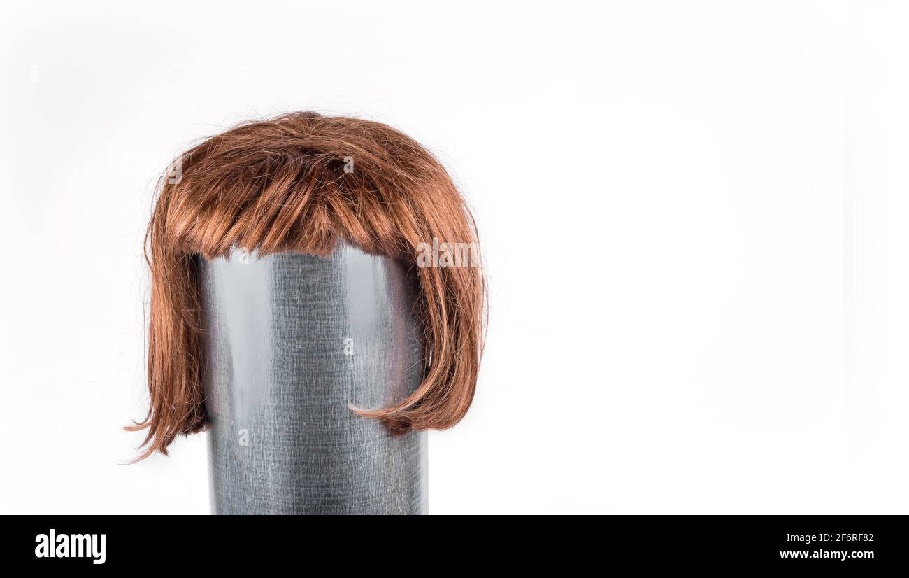 Short red hair wig on a white background Stock Photo Alamy