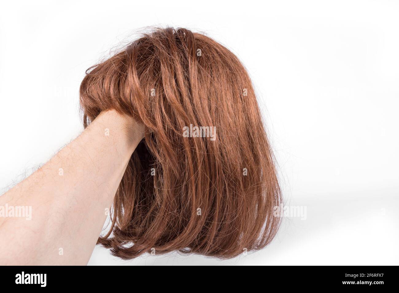 Short red hair wig on a white background Stock Photo Alamy