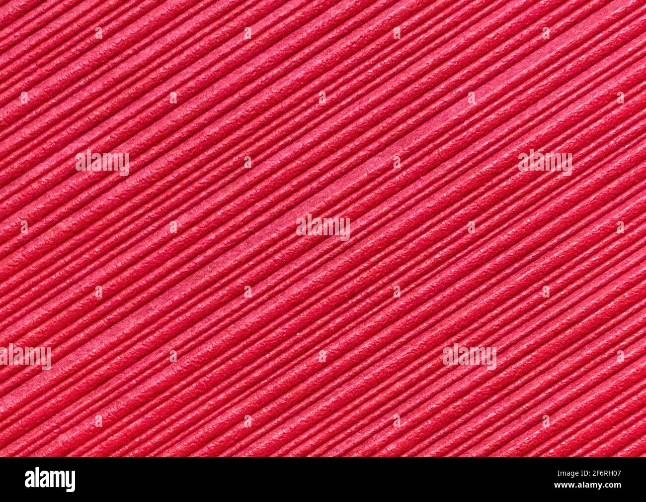 Red abstract striped pattern wallpaper background, paper texture with