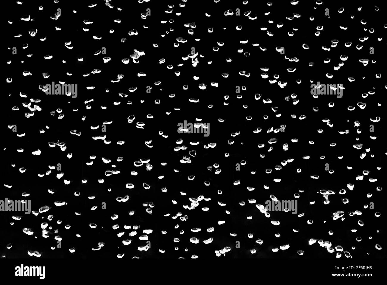 Isolated water splash on black background Black and White Stock Photos ...