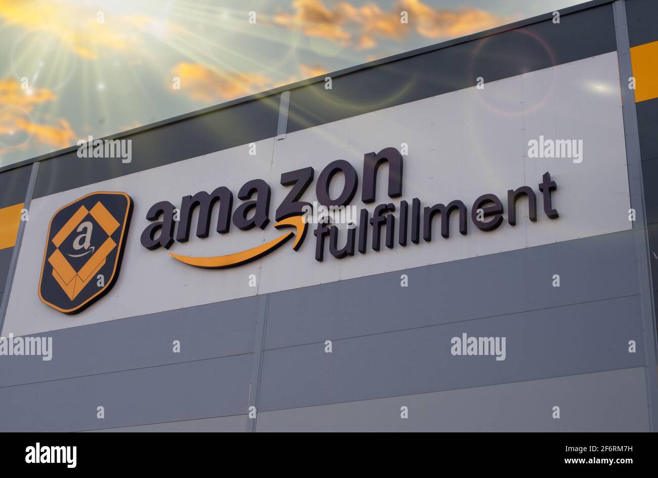Poznan, Poland April 02, 2021 Amazon logo on the facade of a building sunset Stock Photo