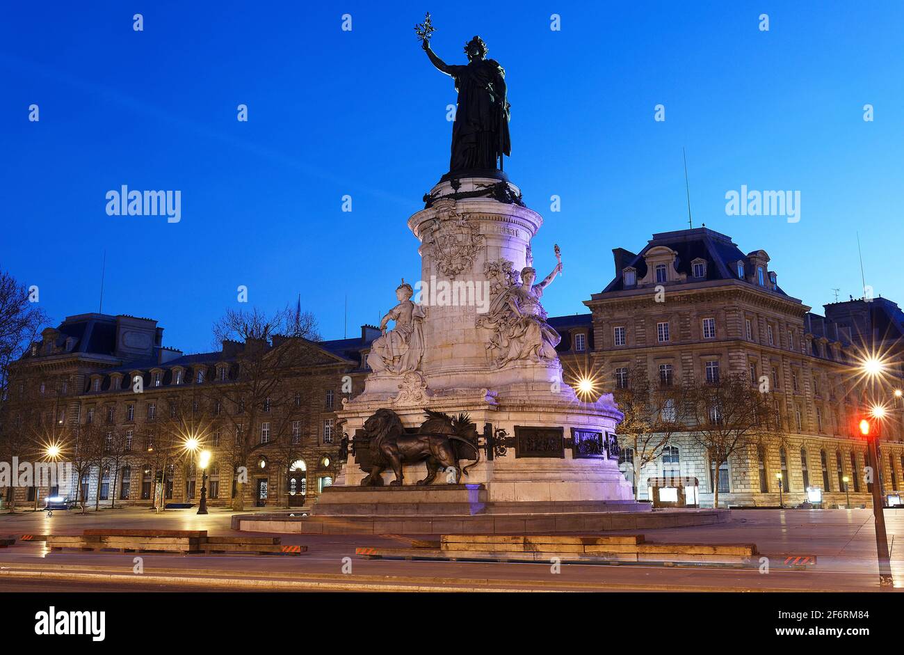 Monument to the republic at night . It is bronze statue of Marianne, a personification of the French republic at the Place de Republique in Paris, Fra Stock Photo