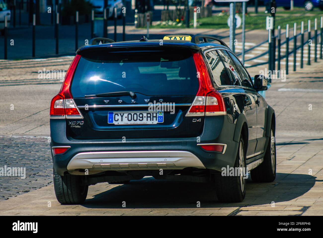 Reims France April 2, 2021 Taxi for passengers rolling in the streets of Reims during the coronavirus pandemic affecting France Stock Photo