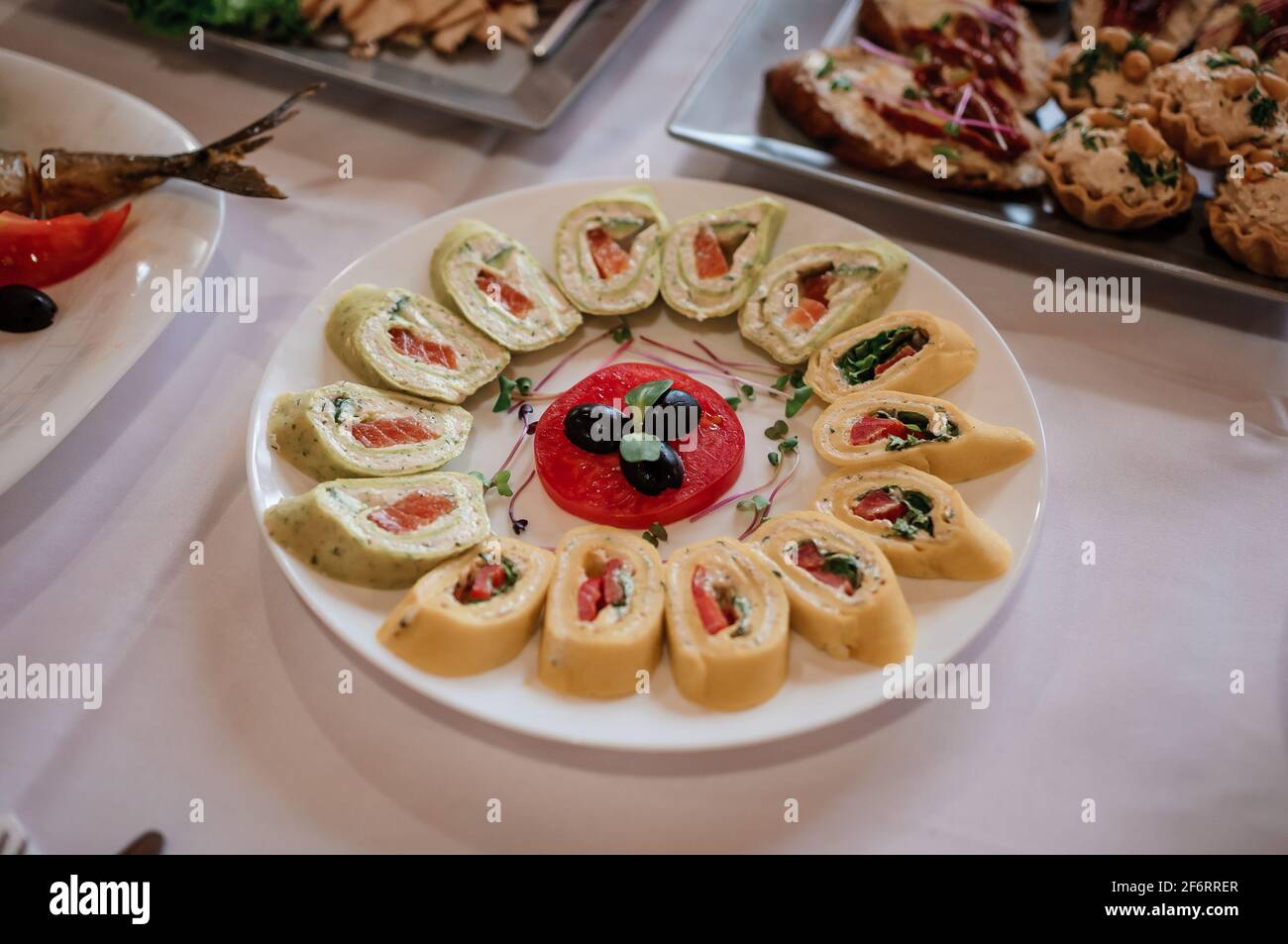 Different types of sliced meat with vegetables. Banquet festive dishes