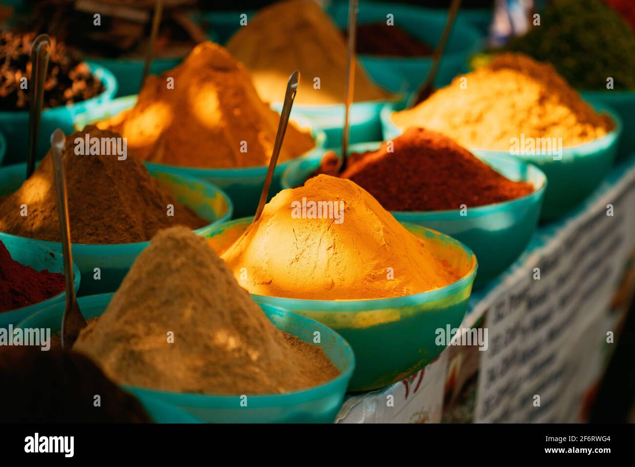 Close View Of Masala Curry, Bright Colors Fragrant Seasoning, Condiment In Tray On Local Food Market, Bazaar. Stock Photo