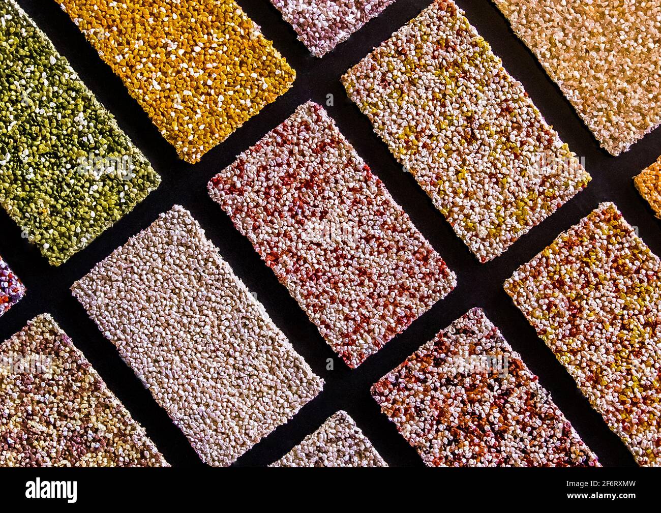 Samples of multi-colored drywall construction material for the ...
