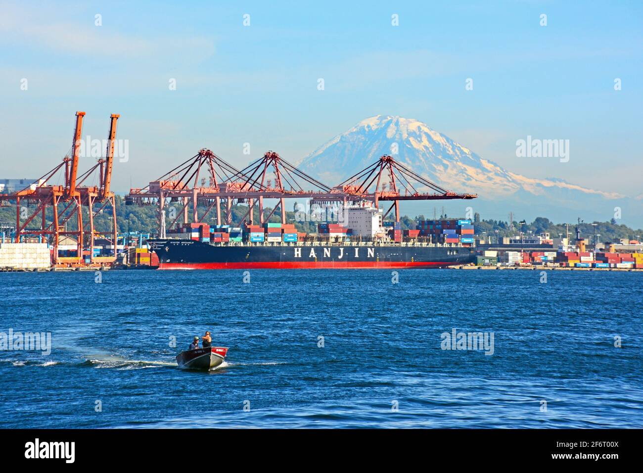Port of Seattle day at mid day with a ship and cargo cranes, washington, USA Stock Photo