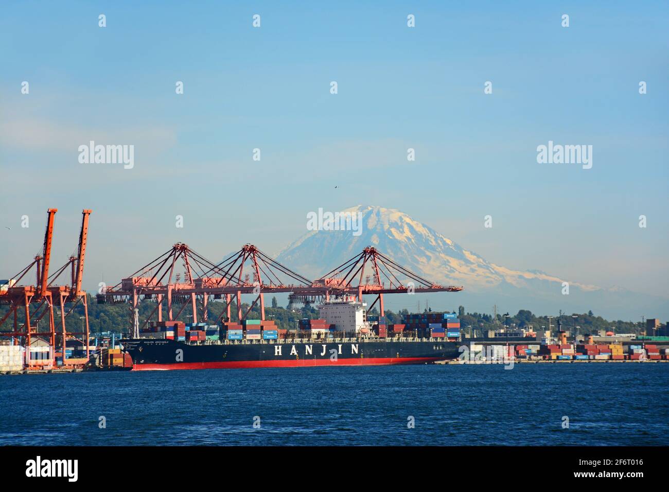 Port of Seattle day at mid day with a ship and cargo cranes, washington, USA Stock Photo