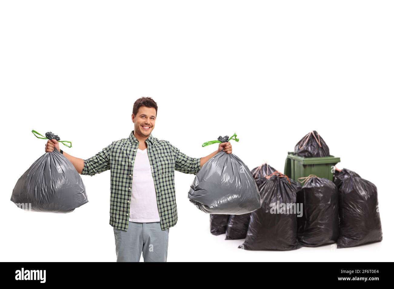 Young guy throwing garbage isolated on white background Stock Photo Alamy