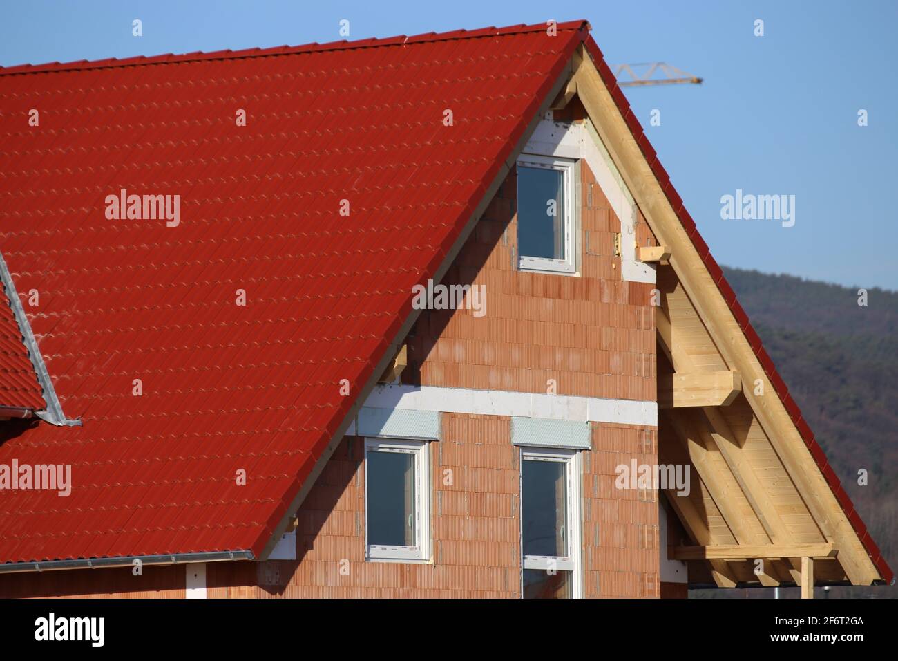 New tile roof on a residential house. Stock Photo