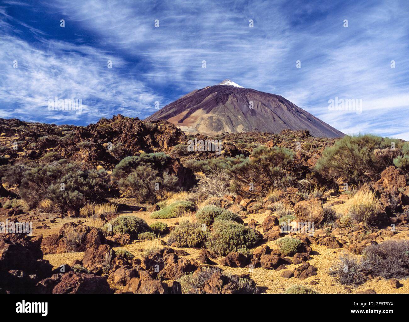 Mount Teide is a volcano on Tenerife in the Canary Islands, Spain. Its 3,718-metre summit is the highest point in Spain and the highest point above Stock Photo