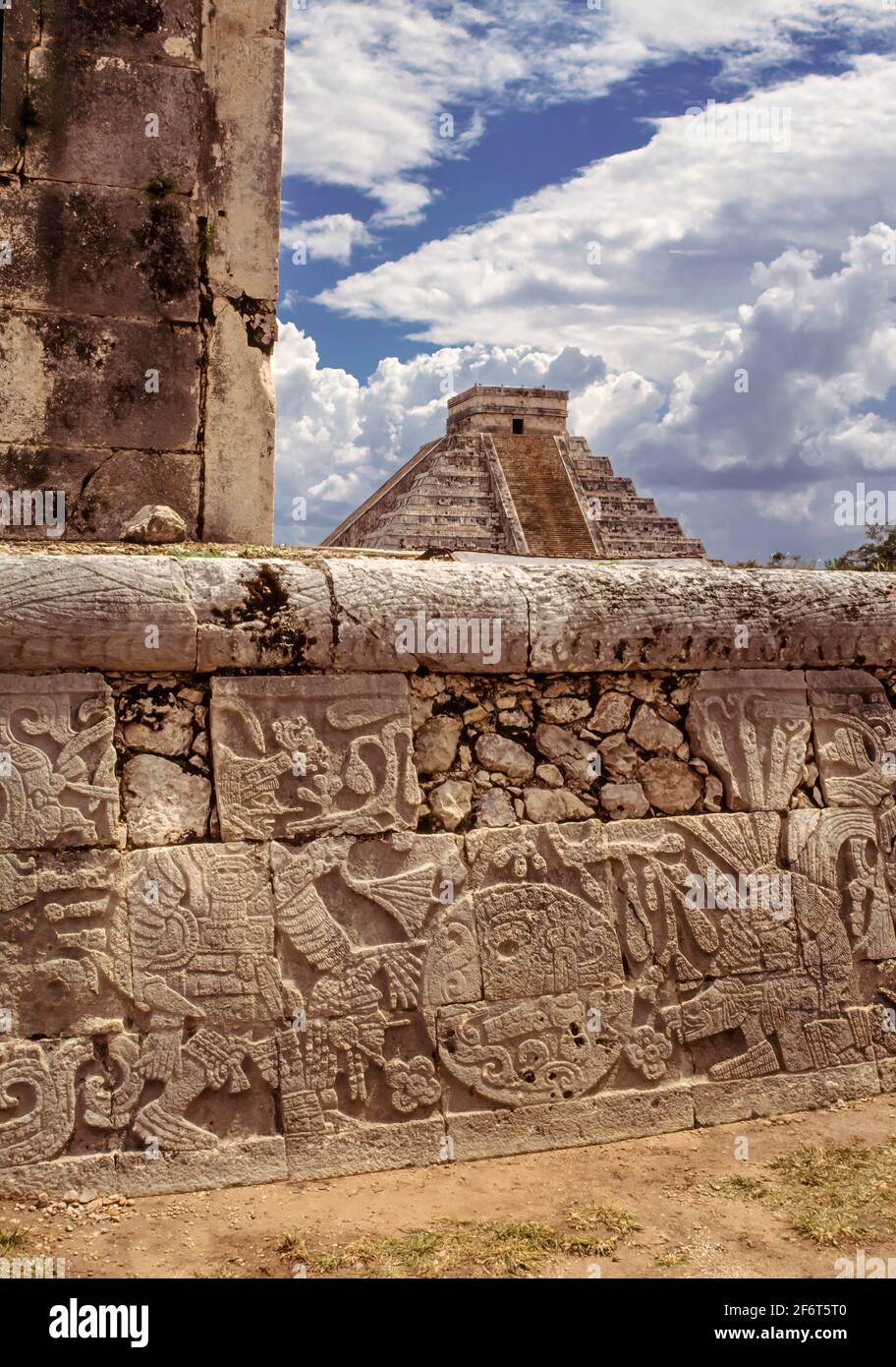 Ancient Mesoamerican players would have played a ball game using a rubber ball on a masonry field in an I-shaped court. Hoops on either side are Stock Photo