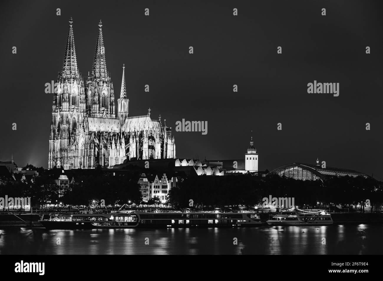 Cologne, Germany. View Of Cologne Cathedral. Catholic Gothic Cathedral In Night. UNESCO World Heritage Site. Black And White Colors Stock Photo
