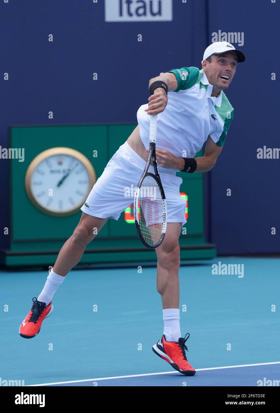 Miami, United States Of America. 02nd Apr, 2021. MIAMI GARDENS, FLORIDA - APRIL 02: Roberto Bautista Agut of Spain serves to Jannick Sinner of Italy in the semifinals during the Miami Open at Hard Rock Stadium on April 02, 2021 in Miami Gardens, Florida. (Photo by Alberto E. Tamargo/Sipa USA) Credit: Sipa USA/Alamy Live News Stock Photo