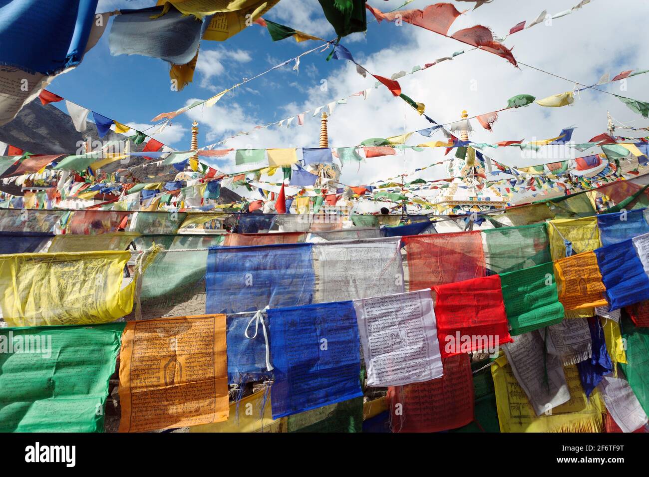 Prayer flags with stupas - Kunzum La pass - Himachal Pradesh - India Stock Photo