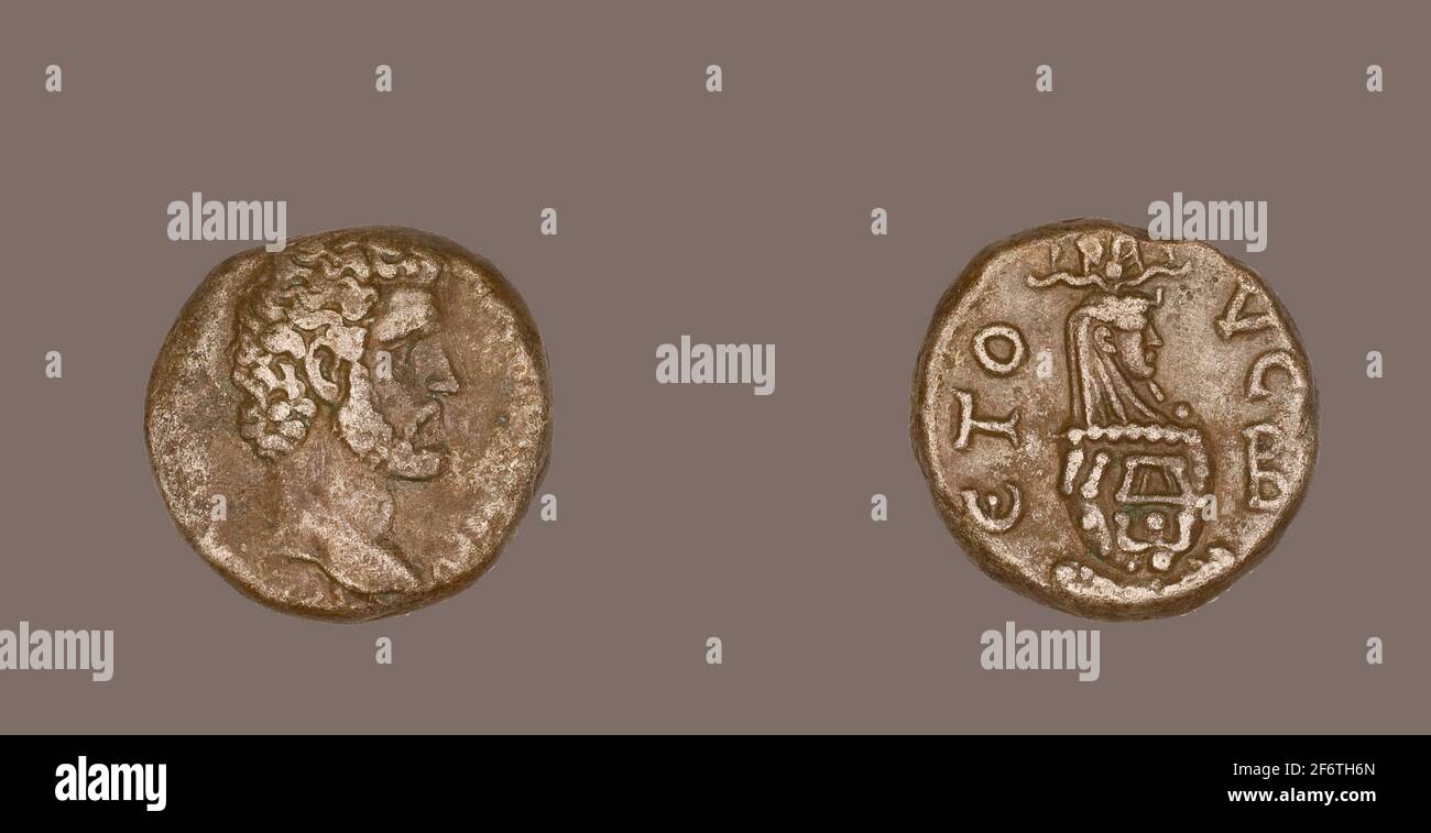 Author: Ancient Egyptian. Coin Portraying Emperor Antoninus Pius - AD 138 - 161 - Roman, minted in Alexandria, Egypt. Billon. 138 AD - 161 AD. Stock Photo