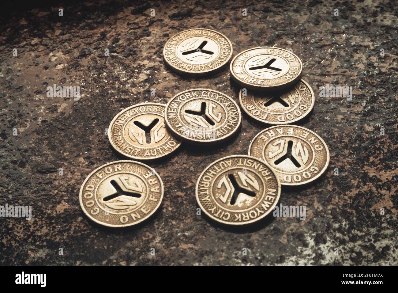 Tokens of a time gone by MBTA's brass tokens pull out of station