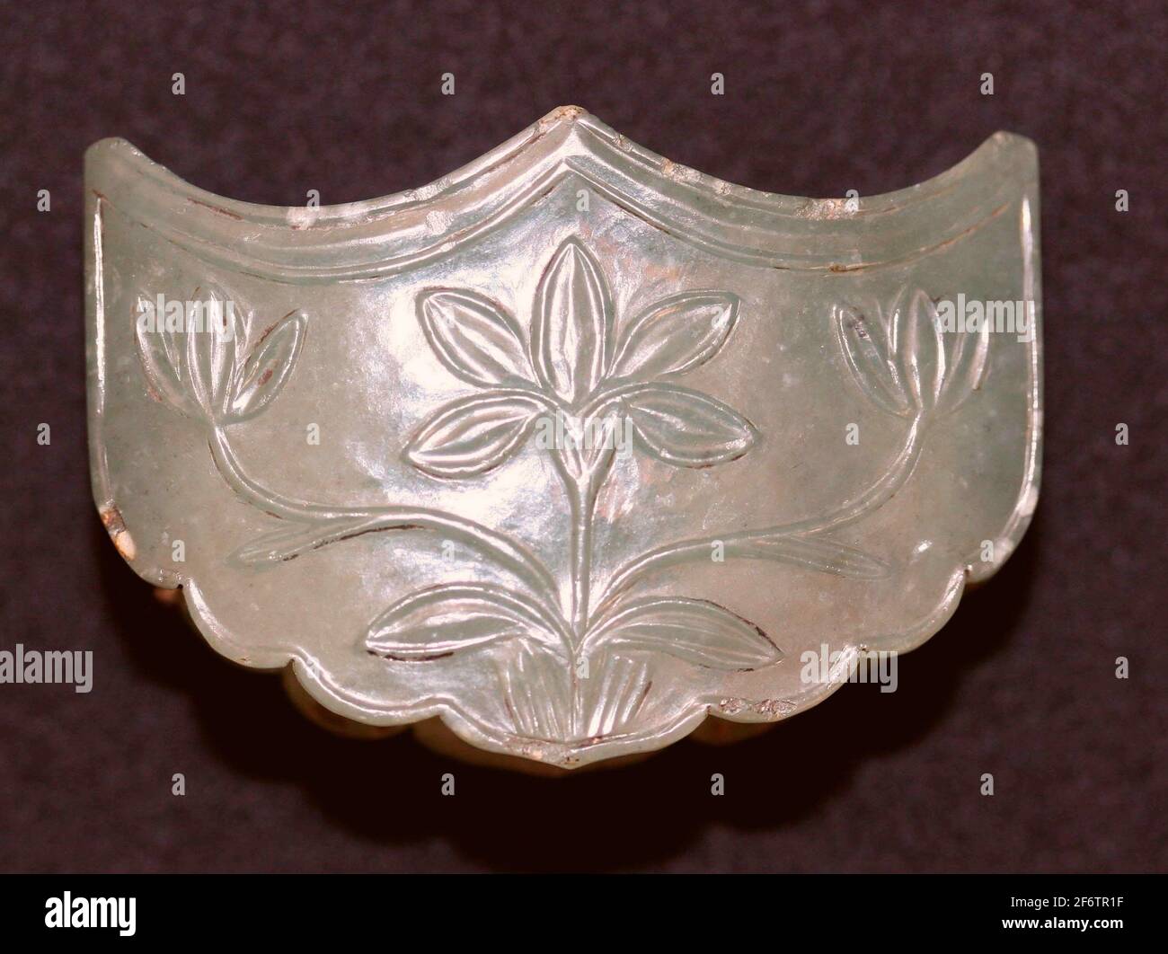 Sword Guard with Floral Design-Mughal period, 18th century-India. Jade. 1701-1800. Stock Photo
