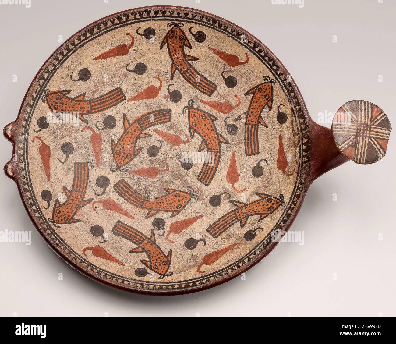 Author: Inca. Minitature Tray Depicting Suche Fish and Peppers - A.D. 1450/1532 - Inca Probably vicinity of Cuzco, Peru. Ceramic and pigment. 1450 - Stock Photo