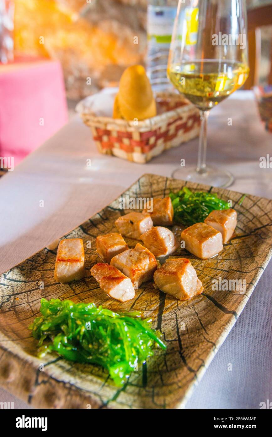 Grilled tuna loin with wakame seaweeds Stock Photo Alamy