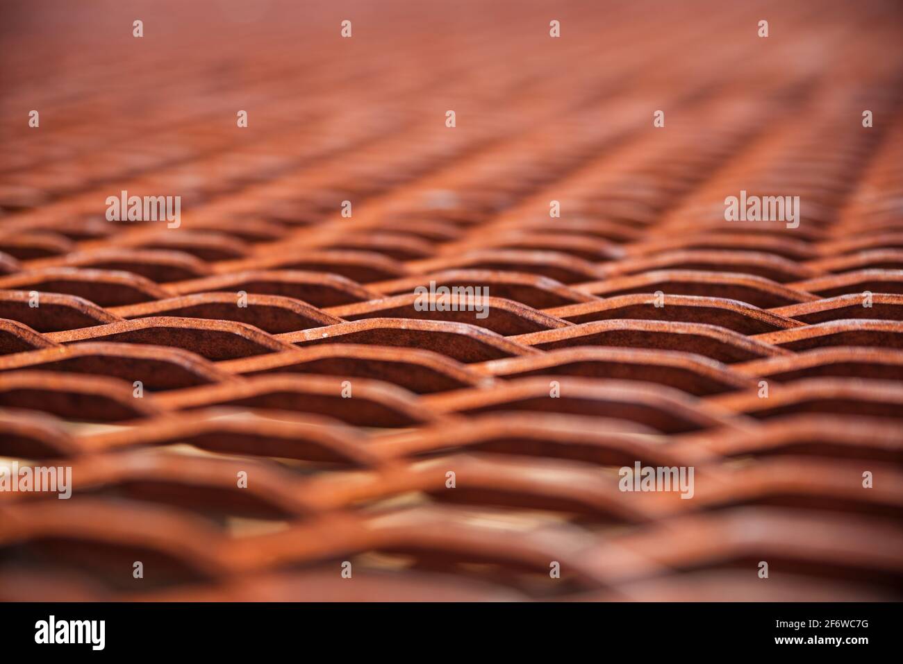rusty metal mesh background with shallow depth of field Stock Photo