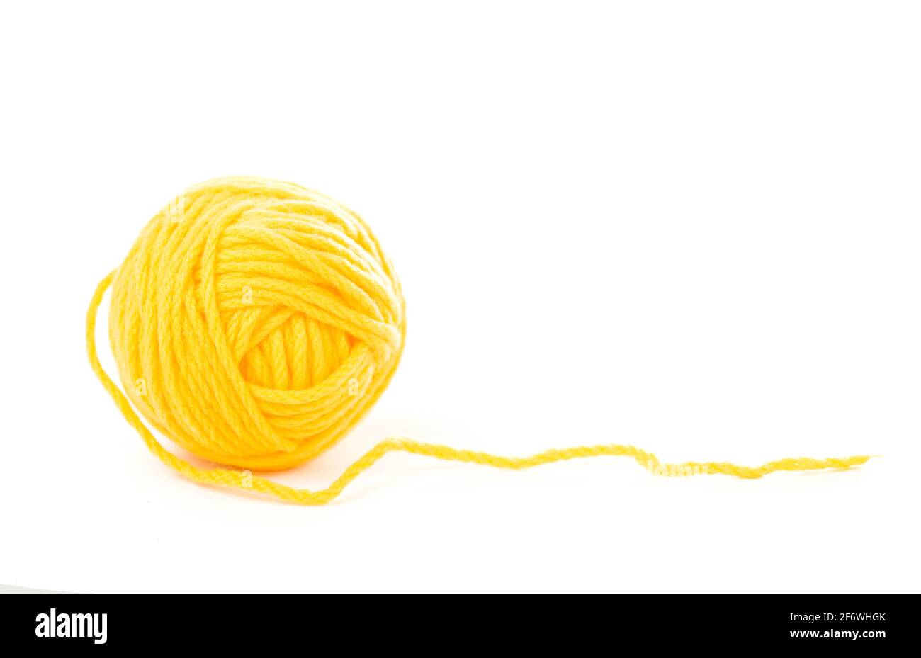needles for knitting on the white background Stock Photo - Alamy
